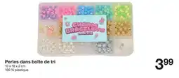 Perles dans boite de tri