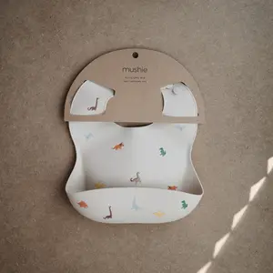 Bavoir à poche en silicone Dinosaure