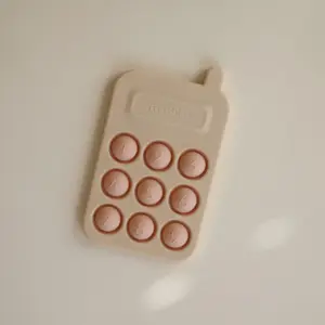 Pop it en silicone Téléphone blush