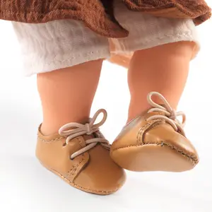Chaussures Pomea marron pour poupée