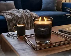 Bougie parfumée ébène et tonka en verre noir Atmosphera Alma 855 g