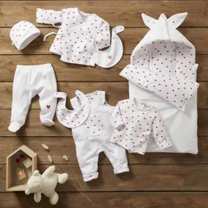 Ensemble cache-coeur + pantalon à pied Mon petit coeur (3 mois)