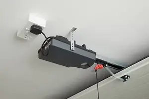 Motorisation pour porte de garage sectionnelle