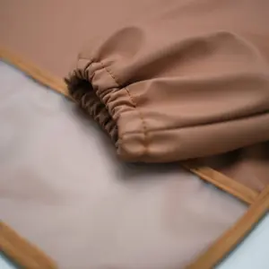 Bavoir plastifié manches longues Terracotta