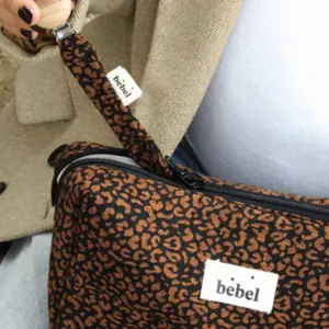 Attache sucette léopard noir