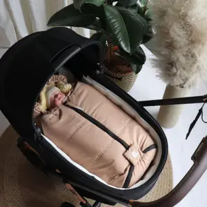 Chancelière pour siège-auto bébé en peau d'agneau NAADJA sand