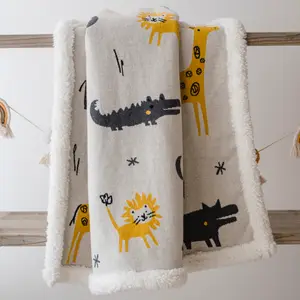 Couverture Zoo en tricot et polaire (80 x 100 cm)