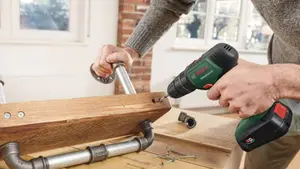 Perceuse visseuse à percussion "universalimpact" 18 v + 210 accessoires