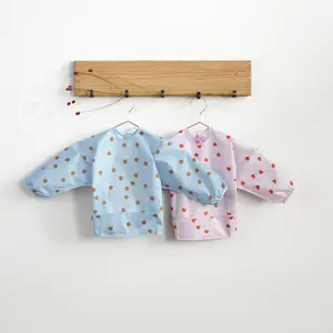 Lot de 2 bavoirs manches longues Happy Rascals Smile bleu ciel
