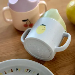Tasse d´apprentissage en polypropylène et cellulose Happy Fruits citron