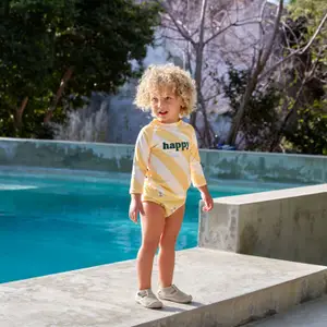 T-shirt anti-UV manches longues Rayures jaune pâle et sel marin (5-6 ans)