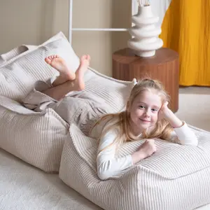 Fauteuil pouf et repose-pieds Marshmallow velours côtelé