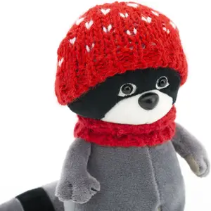 Raton laveur avec bonnet rouge Daisy (15 cm assis)
