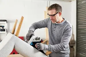 Lunettes de protection enveloppantes avec écrans latéraux intégrés