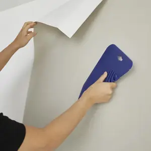 Outil de lissage - pour papier peint