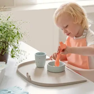 Bavoir élastique Raffi Corail
