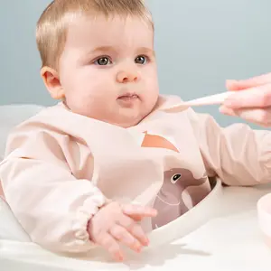 Bavoir à manches avec poche Playground rose