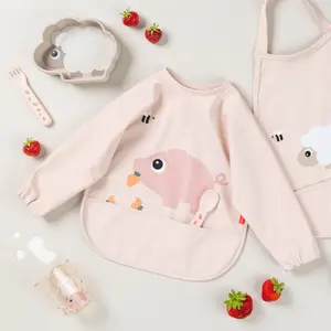 Bavoir à manches avec poche Tiny farm Rose
