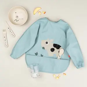 Bavoir à manches avec poche Tiny farm Bleu
