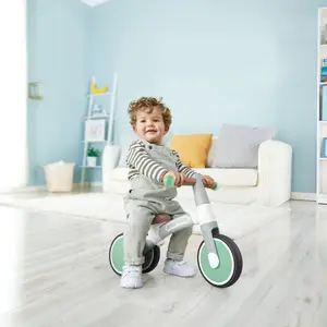 Premier tricycle pastel vert