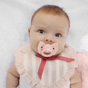 Sucette orthodontique en silicone Binky Bow Misty Pink (3 mois et +)