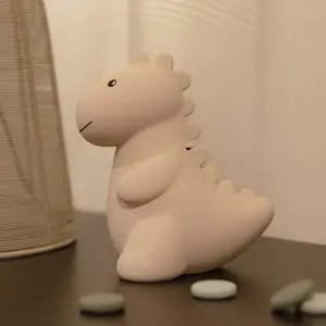 Tirelire Jéroom le dinosaure sable (15 cm)
