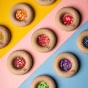 Hochet sensoriel Sensory Donut fraises