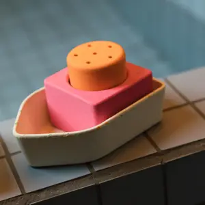 Jouet de bain bébé bateau en caoutchouc orange