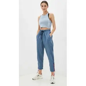 Reebok Pantalon Femme ample avec poches devant GR9439
