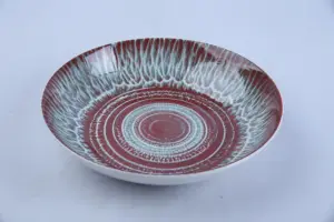 Assiette à pâtes motif spirale rouge 23 cm