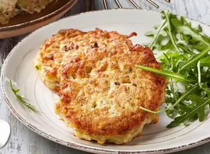 RÂPÉ DE POMMES DE TERRE LARDONS OIGNONS